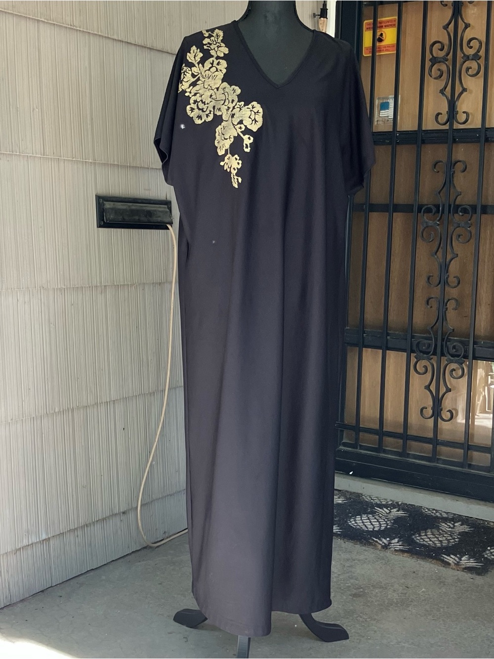 Black Maxi Dress with Gold Floral Accent